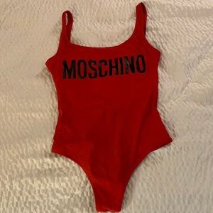 Red one piece moschino bathing suit